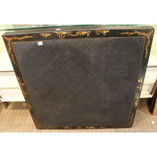 196 - An ebonised folding card table with gilded Chinoiserie decoration