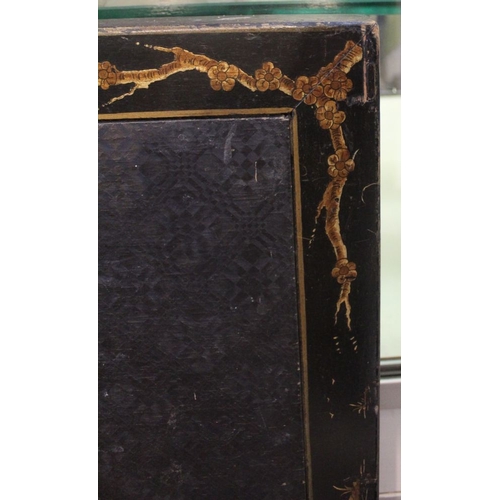 196 - An ebonised folding card table with gilded Chinoiserie decoration