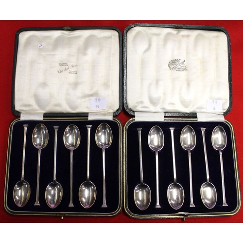 2 - Two cased sets of six silver coffee spoons, with nail terminals, Sheffield 1915 and 1921, combined w... 