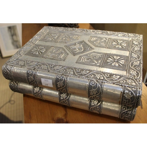 218 - A metal silver coloured jewellery box in the form of two books with contents