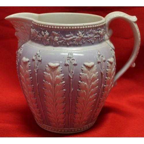 220 - A 19th century stoneware tankard with bucolic mouldings, a Victorian jug with acanthus leaf decorati... 