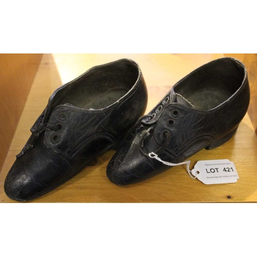 222 - A pair of Chinese black leather 