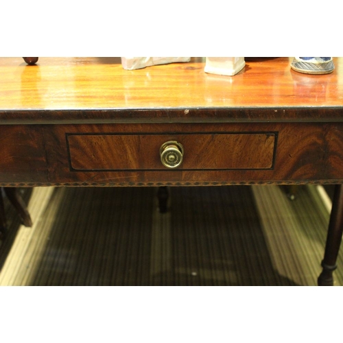 236 - A nineteenth century mahogany fold over tea table fitted one drawer raised on ring turned supports 9... 