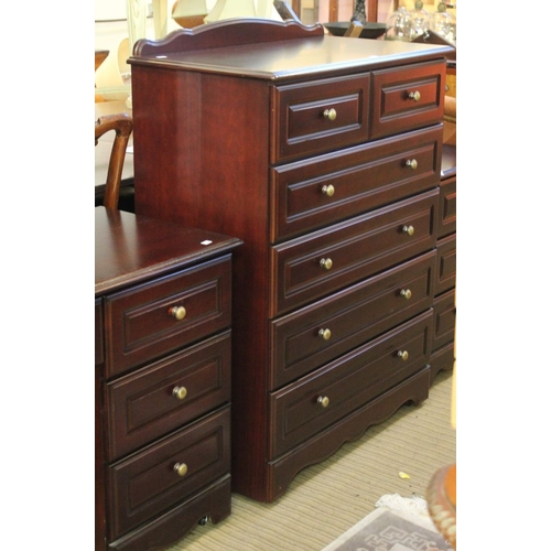 255 - A part bedroom suite comprising chest of drawers, dressing table and bedside tables 