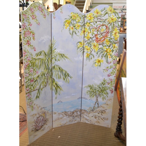 264 - A hand painted three section draught screen, painted with tropical landscape decoration, 152cm high