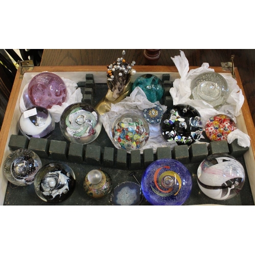 265 - A collection of Caithness paperweights with an assortment of hat pins