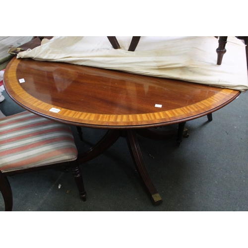 274 - A late 19th century mahogany dining table satin wood cross banded on turned stem with four supports.... 