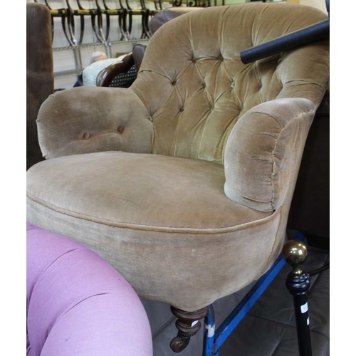 281 - A light brown button backed armchair