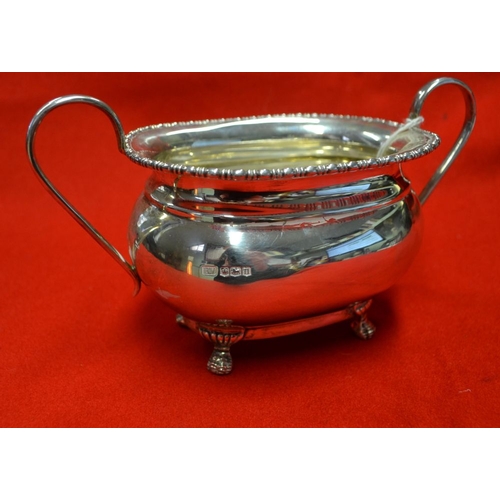 29 - Emile Viner, a silver two handled sugar bowl, raised on paw feet, Sheffield 1930, 334g