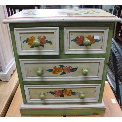 306 - A small chest of two short over two long drawers, decoratively painted