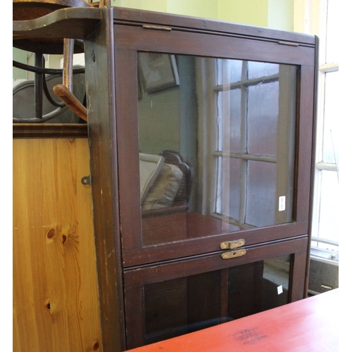 325 - A stained wood wall mounting over dresser unit fitted four glazed doors 224 cm width