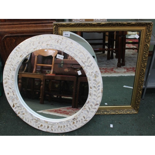 338 - A gilt framed wall mirror with another circular example