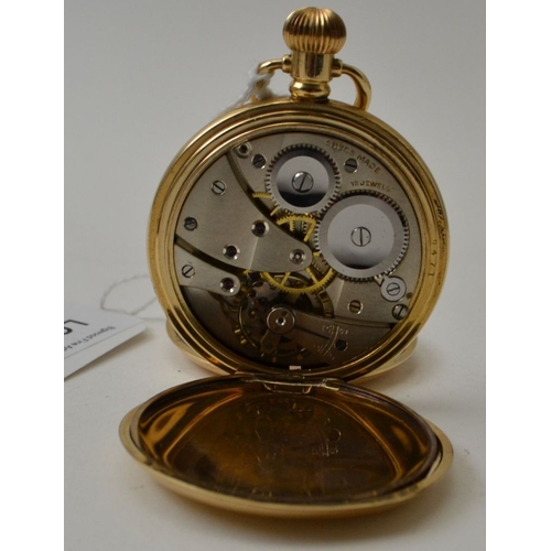 34 - A gold plated half-hunter pocket watch, the white enamel dial inscribed 