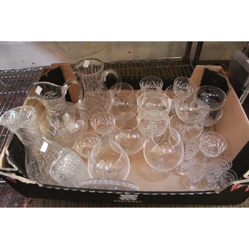 369 - Three cut glass jugs together with a good selection of glasses and glassware