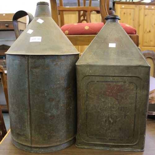 387 - Two vintage substantial oil cans