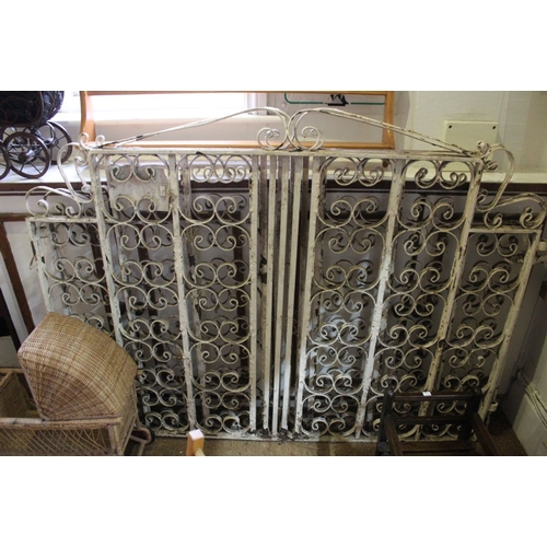 412 - A pair of substantial white painted wrought iron garden gates