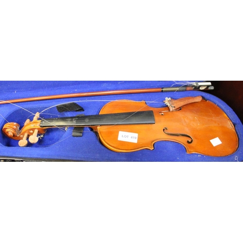 419 - A collection of three violins in cases