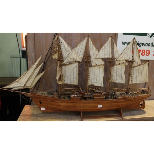 73 - A large hand built model of a sailing galleon. Four masts and intricate detail to the deck. Approxim... 