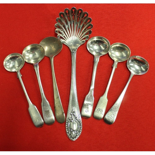 9 - Martin Hall and Co, a Victorian silver sifting ladle, Sheffield 1865, together with six silver condi... 