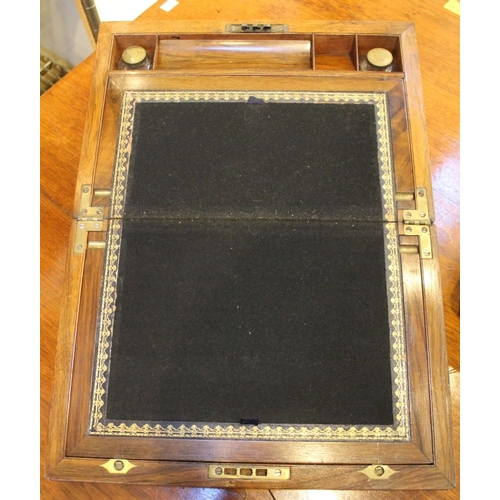 107 - A 19th century brass bound writing slope with another brass bound casket