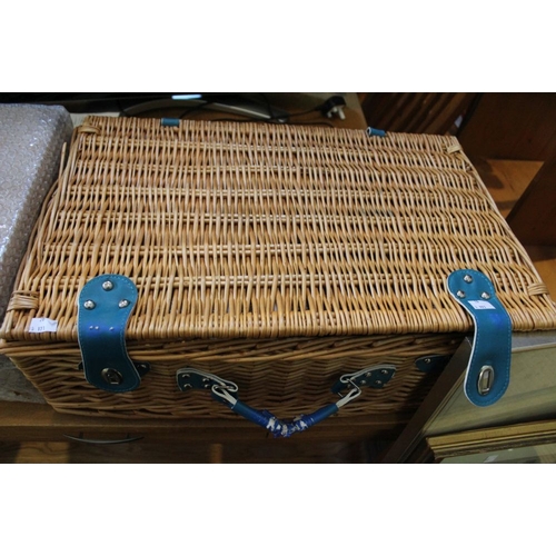 247 - A wicker picnic basket with contents