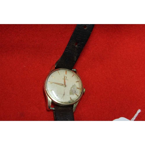 26 - An Omega 9ct gold gentlemans wristwatch, back engraved 