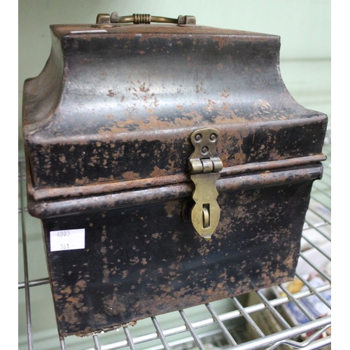 304 - A tin containing assorted badges, coins, a tankard, etc.