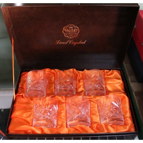 306 - A box containing a large selection of cut glass, all in presentation boxes