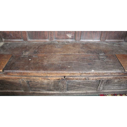 338 - An oak c.1700 box settle, Poor condition, missing bits, iron structural supports, discoloration, wea... 