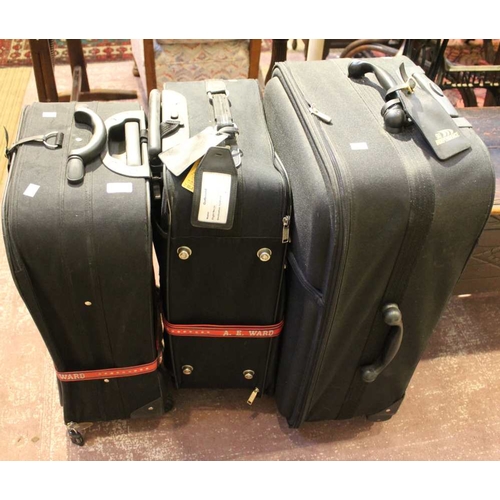 419 - Three black modern suitcases