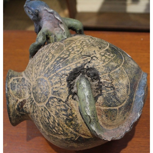 82 - A very unusual urn depicting a lizard emerging from its egg