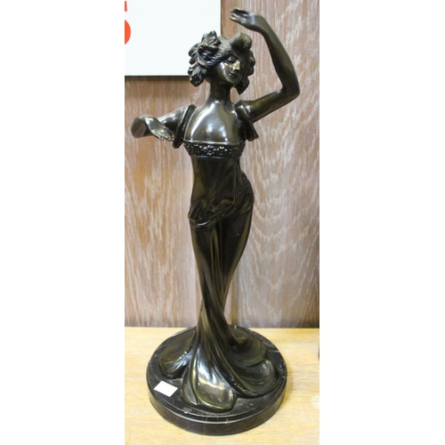 119 - An Art Nouveau design figure of an elegant woman, bronze effect finish, raised on a polished marble ... 