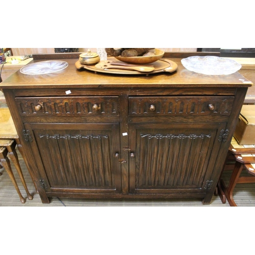 122 - An Old Charm sideboard, two drawers, over two cupboard doors