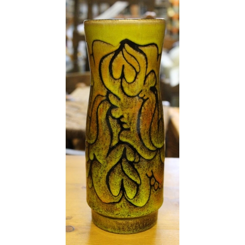 128 - A Poole pottery vase 23cm high