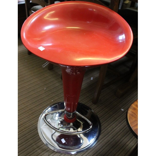 178 - A red gas lift bar stool