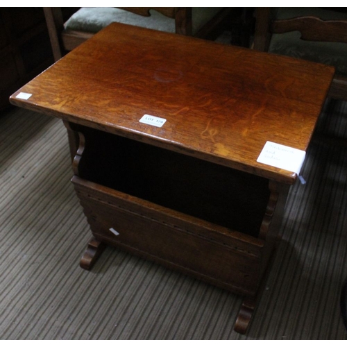 179 - A Titchmarsh and Goodwin coffee table with magazine rack and under tier