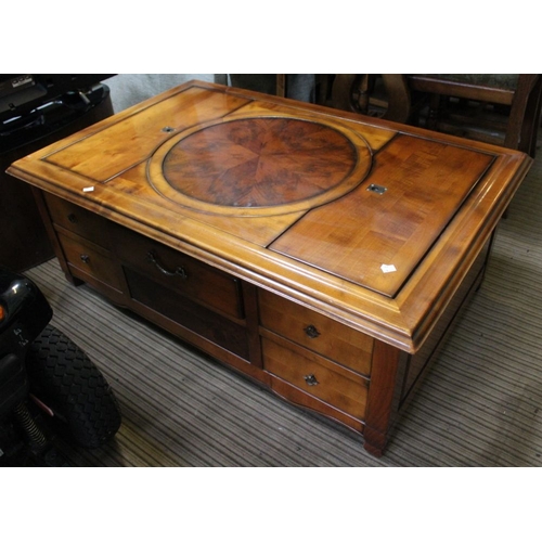 180 - A Lazy Susan coffee table, originally purchased from Lenley's, Canterbury. Lift up storage compartme... 