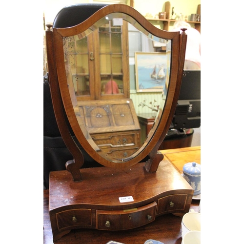 181 - A shield shaped dressing table mirror compartment