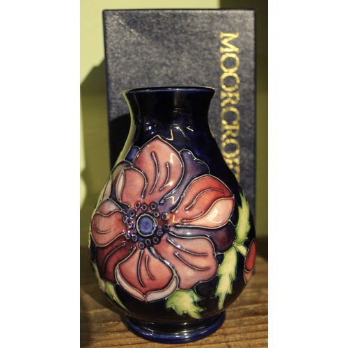 196 - A Moorcroft baluster shaped vase with factory marks to base