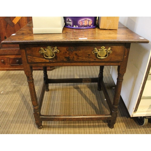 210 - A part George III oak side table, fitted single drawer on turned supports