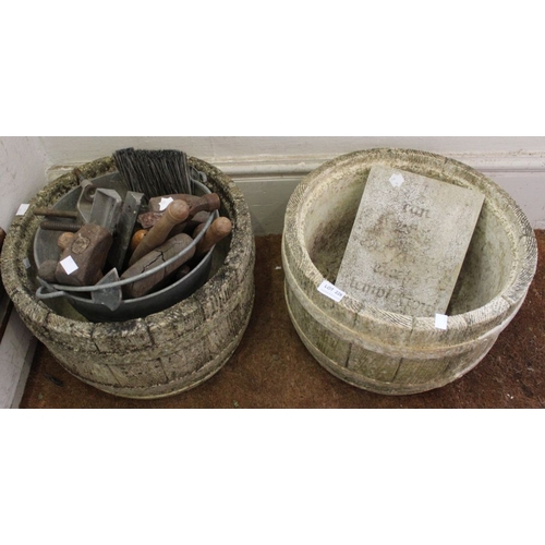 226 - Two cast garden planters with a bucket of vintage tools