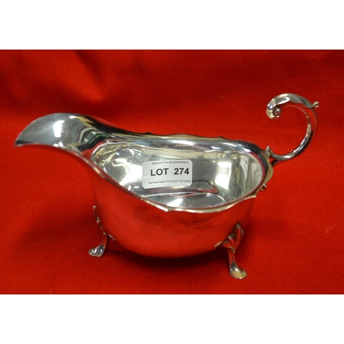 274 - A Georgian design silver gravy boat, with acanthus scroll handle, Sheffield 1959, 286g