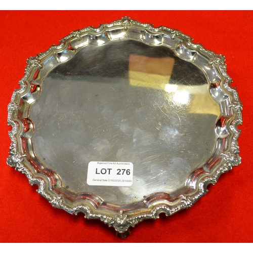 276 - A Georgian design silver salver, cast rim upon three claw feet, 21cm diameter, 370g