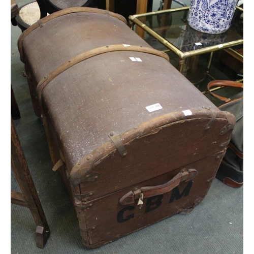 299 - A vintage domed top wooden bound travel trunk