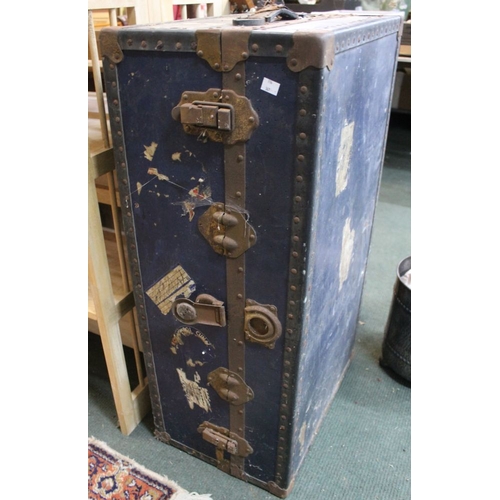 305 - A blue metal bound vintage travel trunk