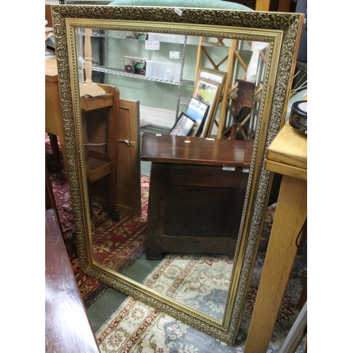 318 - A rectangular gilt framed bevel edged mirror