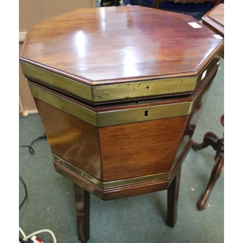 344 - A 19th century mahogany octagonal cellarette brass banded with side handles raised on four supports