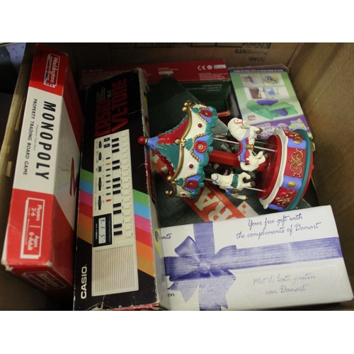 388 - A box containing a selection of children's games, puzzles, etc