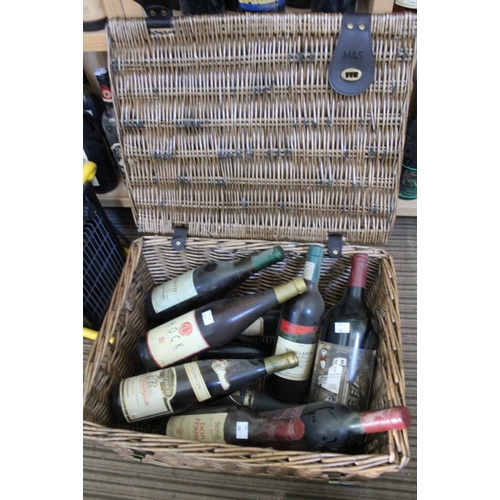 48 - A M&S wicker basket with a selection of mixed wines (10)