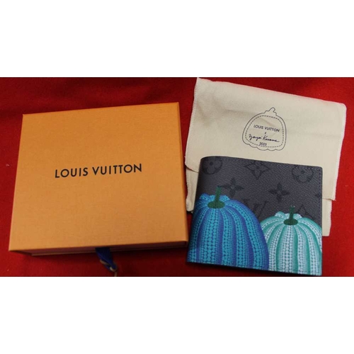 60 - A Louis Vuitton brand new boxed very rare Pumpkin design gentleman's wallet